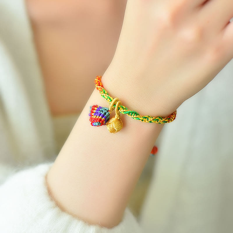 Pulsera con dijes Zongzi hecha a mano con cuerda colorida y Buddha Stones