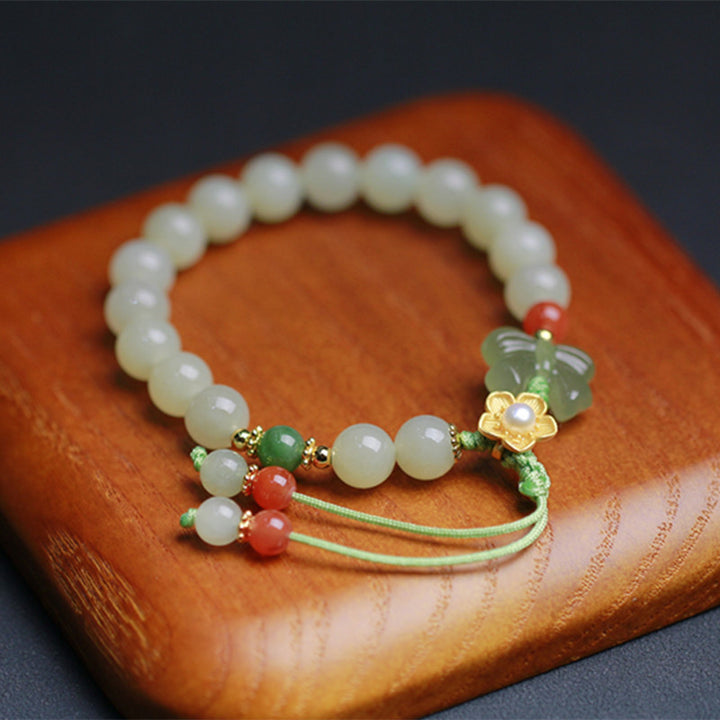 Pulsera de mariposa y flor de la suerte de jade de plata de ley 925 con Buddha Stones