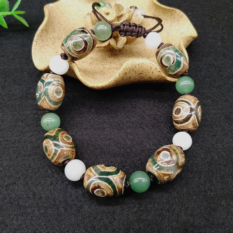 Pulsera trenzada de protección de la suerte con cuentas Dzi tibetanas de tres ojos con Buddha Stones
