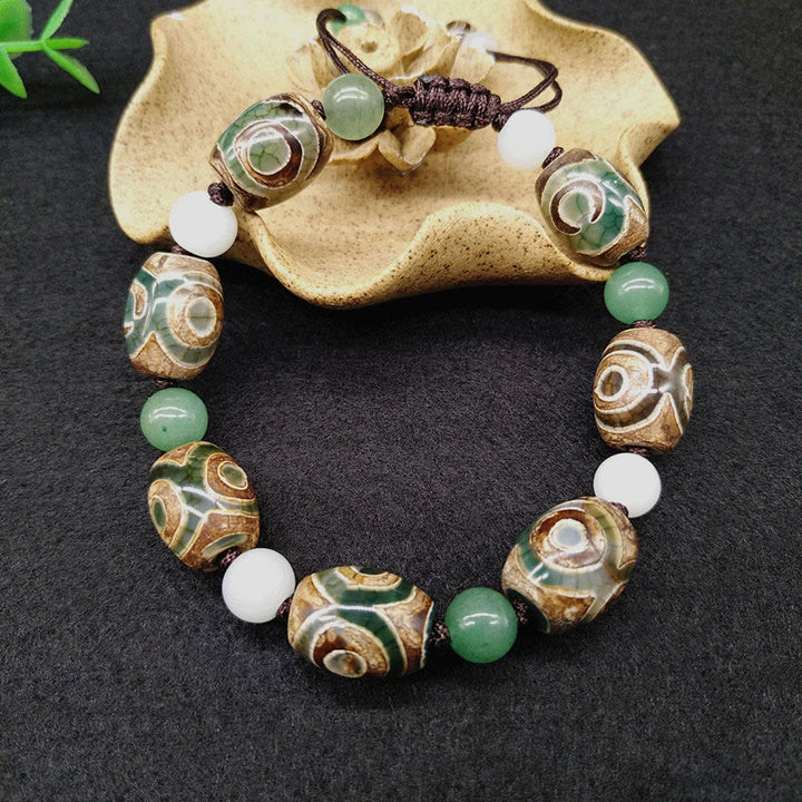Pulsera trenzada de protección de la suerte con cuentas Dzi tibetanas de tres ojos con Buddha Stones