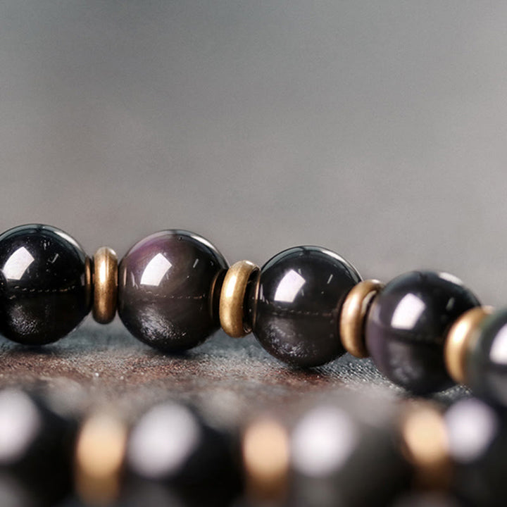 Pulsera curativa de amor de cobre y obsidiana arcoíris con Buddha Stones