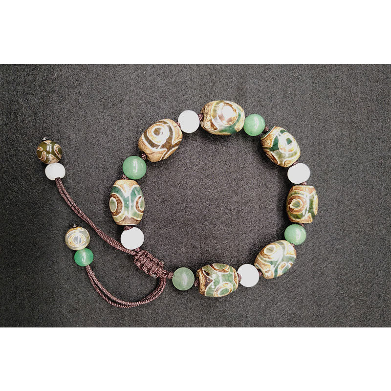 Pulsera trenzada de protección de la suerte con cuentas Dzi tibetanas de tres ojos con Buddha Stones