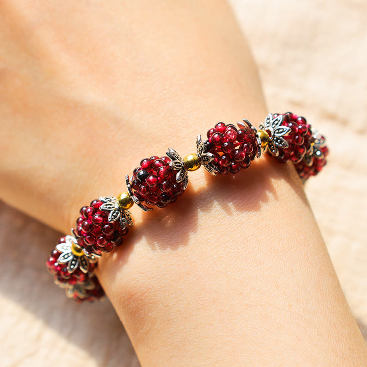 Pulsera curativa de granate natural con Buddha Stones