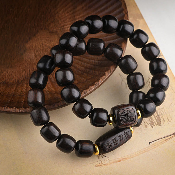 Pulsera de equilibrio de la suerte y el tesoro, cuentas de barril de madera de ébano tibetano, Buddha Stones
