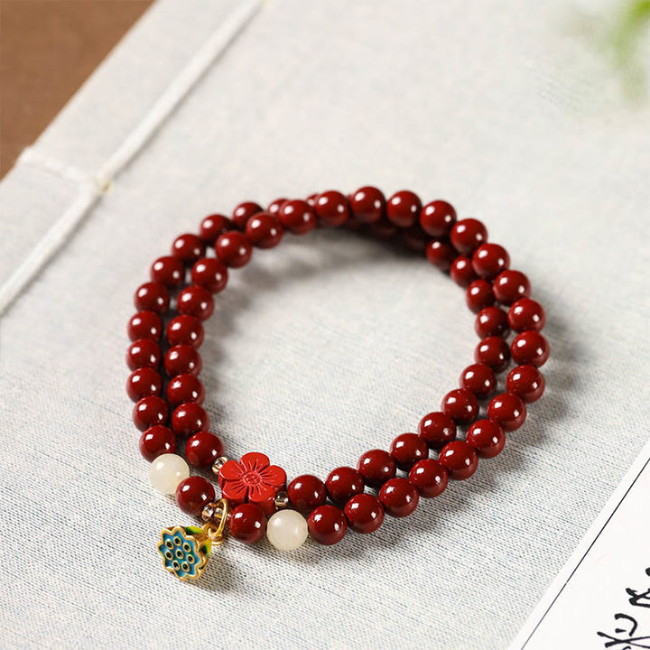 Pulsera de bendición con colgante de loto y cinabrio con Buddha Stones