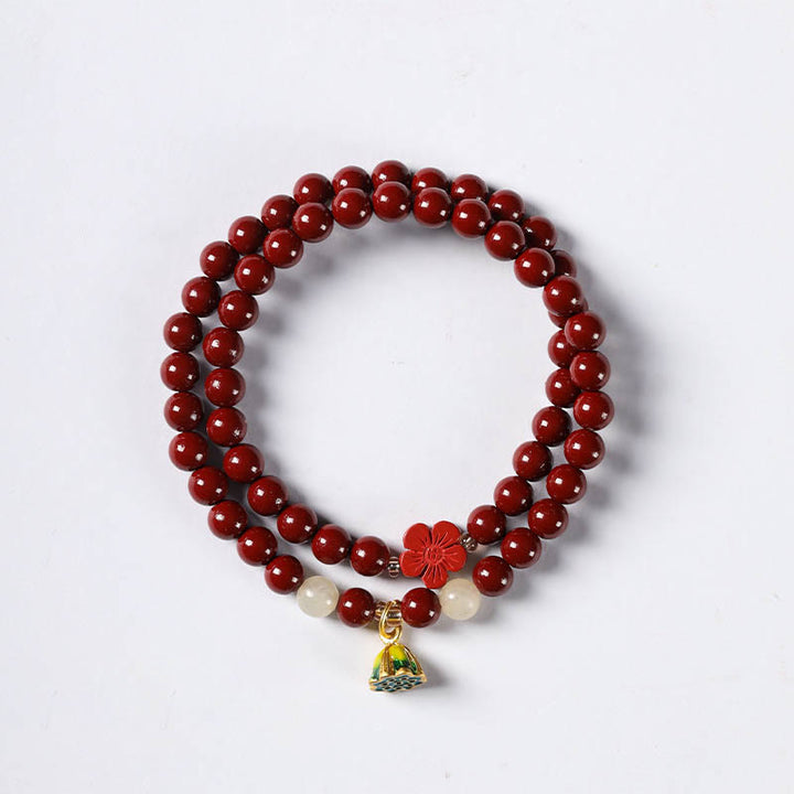 Pulsera de bendición con colgante de loto y cinabrio con Buddha Stones
