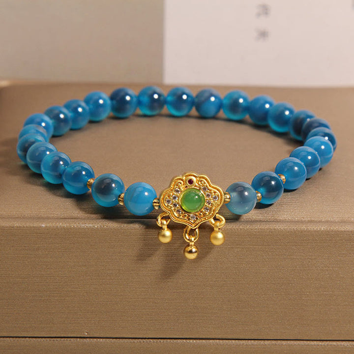 Pulsera curativa con dije de cerradura china de ágata azul caramelo con Buddha Stones