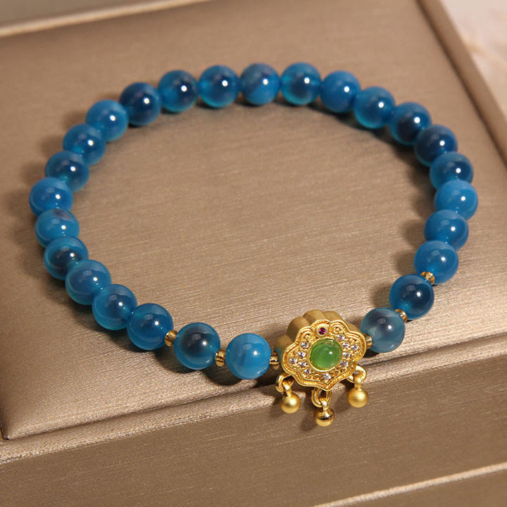 Pulsera curativa con dije de cerradura china de ágata azul caramelo con Buddha Stones