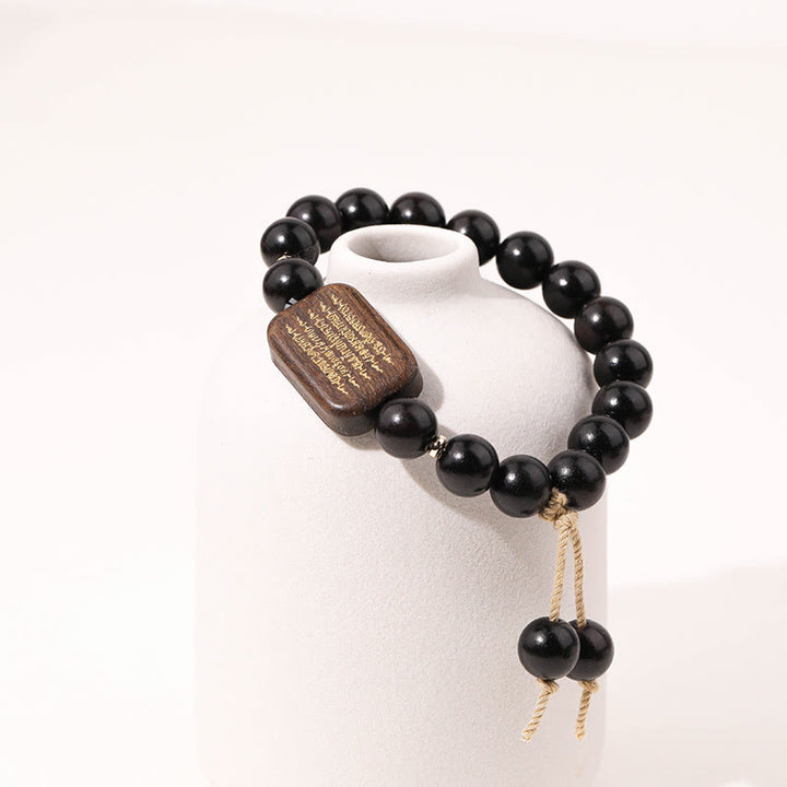 Pulsera de Paz Grabada con Escrituras en Madera de Ébano de Piedras de Buda