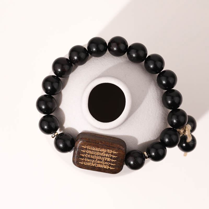Pulsera de Paz Grabada con Escrituras en Madera de Ébano de Piedras de Buda