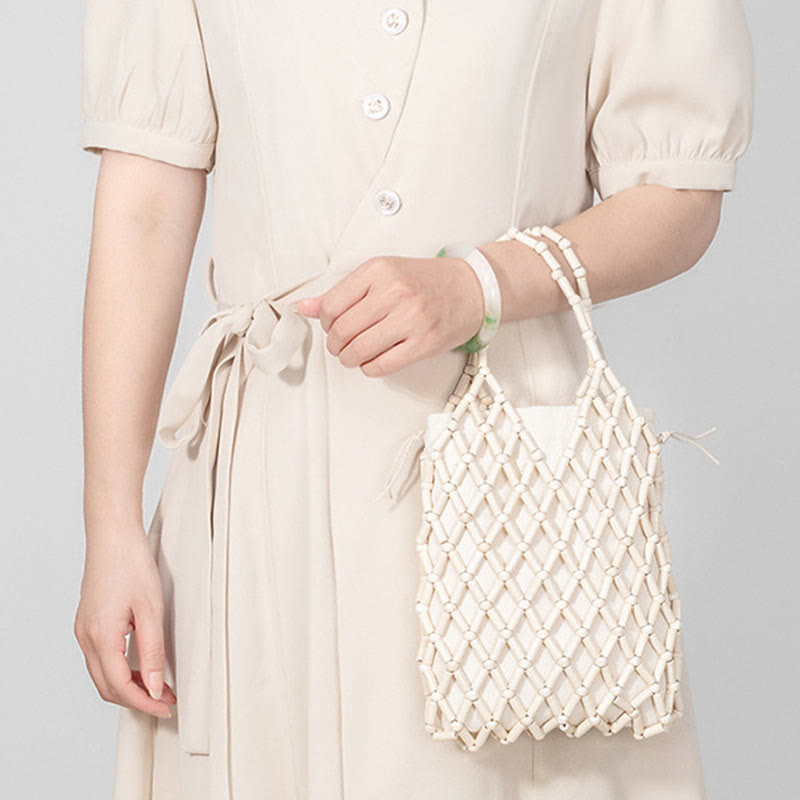 Bolsa de mano de cuentas de madera huecas tejidas a mano con piedras de Buda