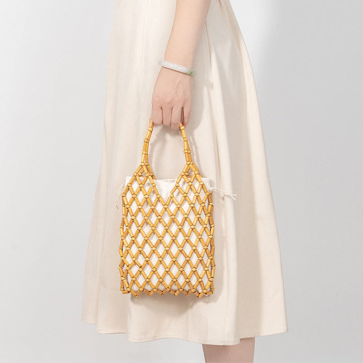 Bolsa de mano de cuentas de madera huecas tejidas a mano con piedras de Buda