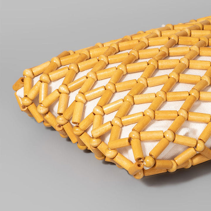 Bolsa de mano de cuentas de madera huecas tejidas a mano con piedras de Buda