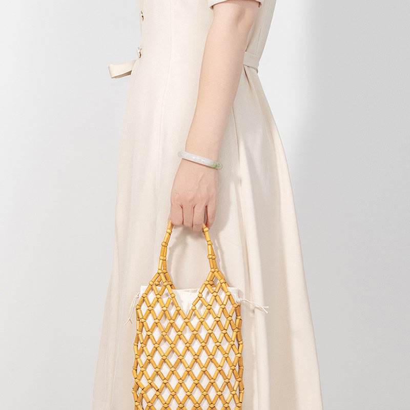 Bolsa de mano de cuentas de madera huecas tejidas a mano con piedras de Buda