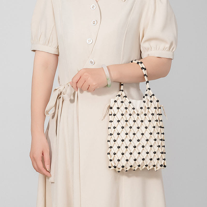 Bolsa de mano de cuentas de madera huecas tejidas a mano con piedras de Buda