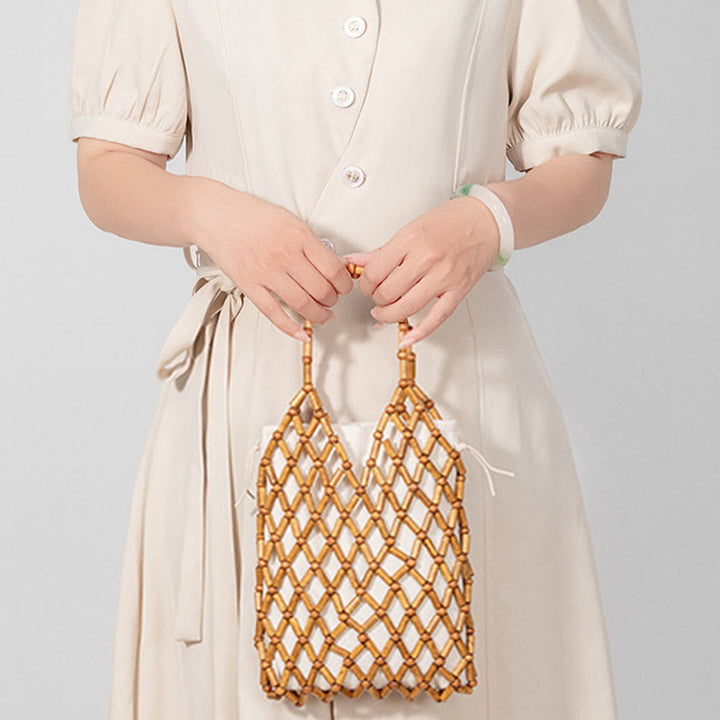 Bolsa de mano de cuentas de madera huecas tejidas a mano con piedras de Buda