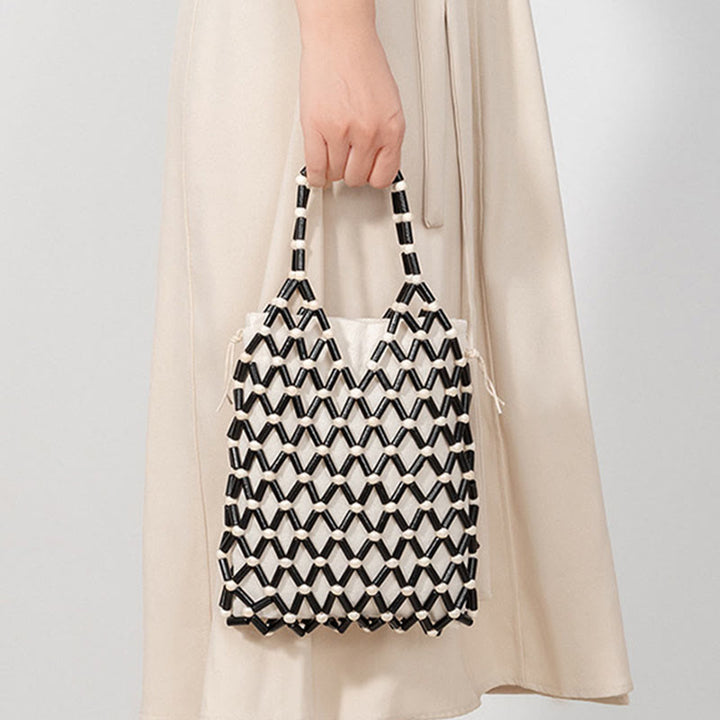 Bolsa de mano de cuentas de madera huecas tejidas a mano con piedras de Buda