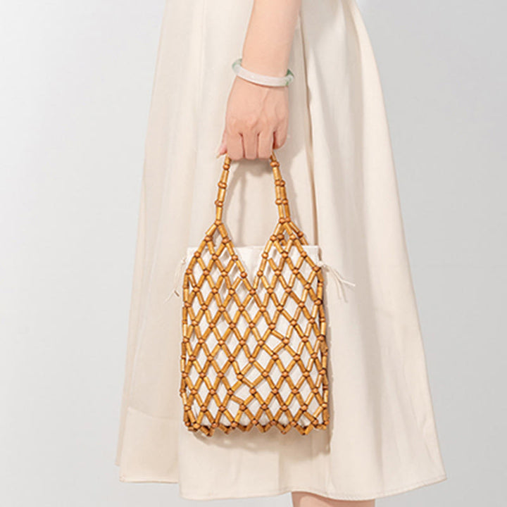 Bolsa de mano de cuentas de madera huecas tejidas a mano con piedras de Buda