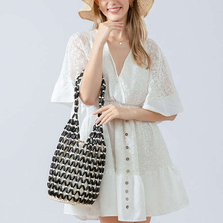 Bolso de hombro con cuentas de madera tejidas a mano de piedras de Buda