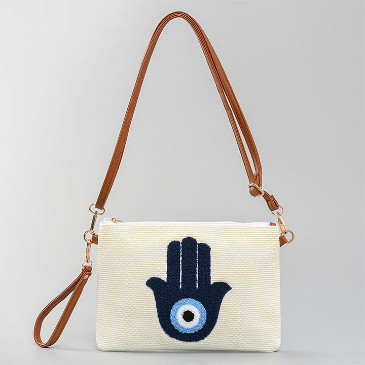 Bolso bandolera de lona de Hamsa con hojas del ojo malo y piedras de Buda