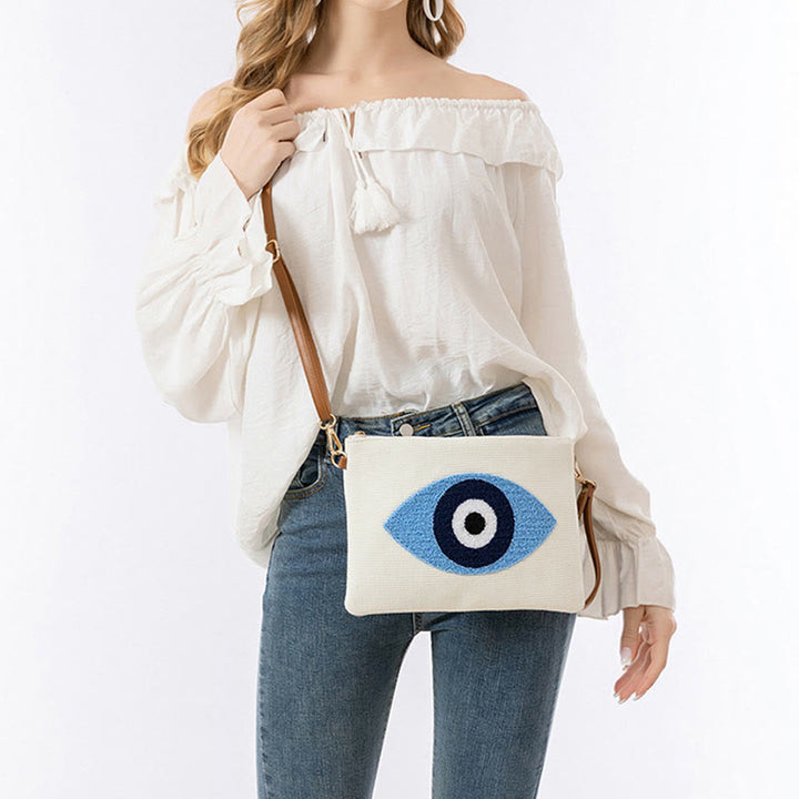 Bolso bandolera de lona de Hamsa con hojas del ojo malo y piedras de Buda