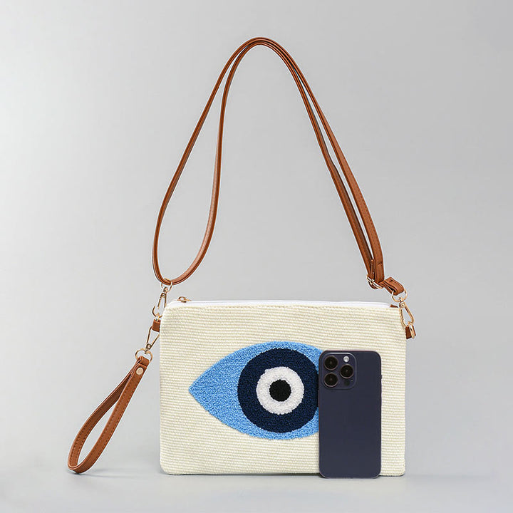 Bolso bandolera de lona de Hamsa con hojas del ojo malo y piedras de Buda