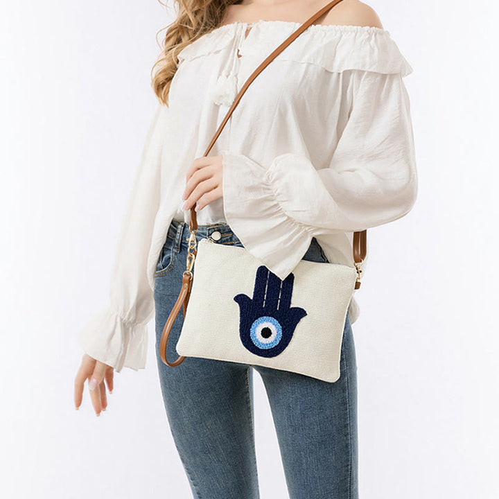 Bolso bandolera de lona de Hamsa con hojas del ojo malo y piedras de Buda