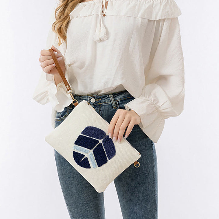 Bolso bandolera de lona de Hamsa con hojas del ojo malo y piedras de Buda