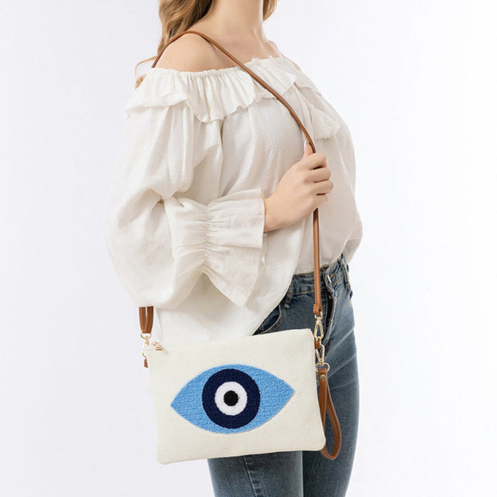 Bolso bandolera de lona de Hamsa con hojas del ojo malo y piedras de Buda