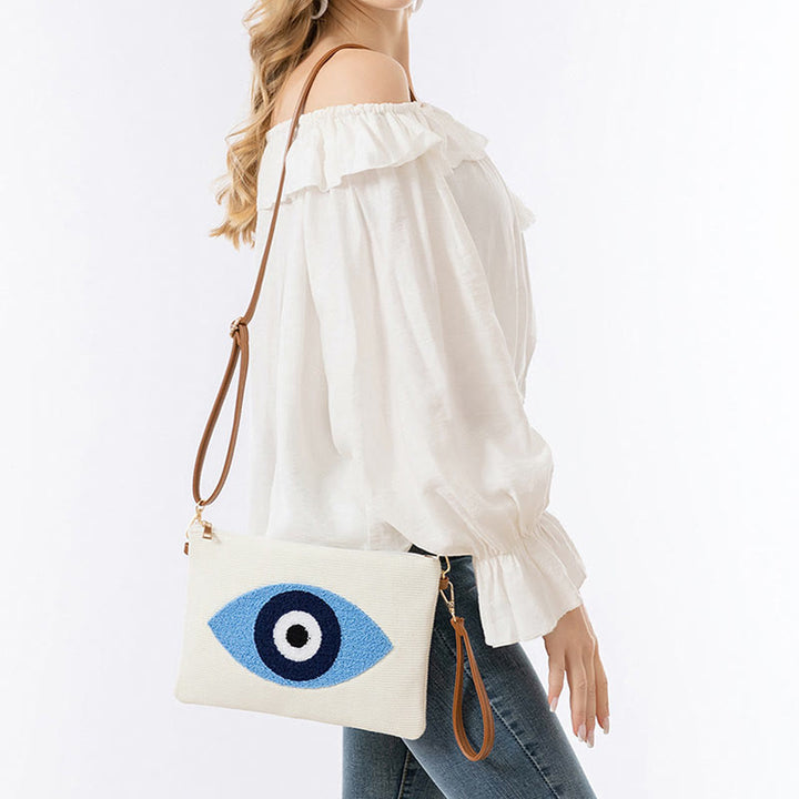 Bolso bandolera de lona de Hamsa con hojas del ojo malo y piedras de Buda