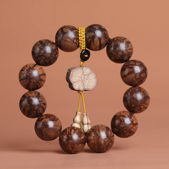Pulsera de Madera de Flor de Ciruelo de Buddha Stones para la Paz Interior
