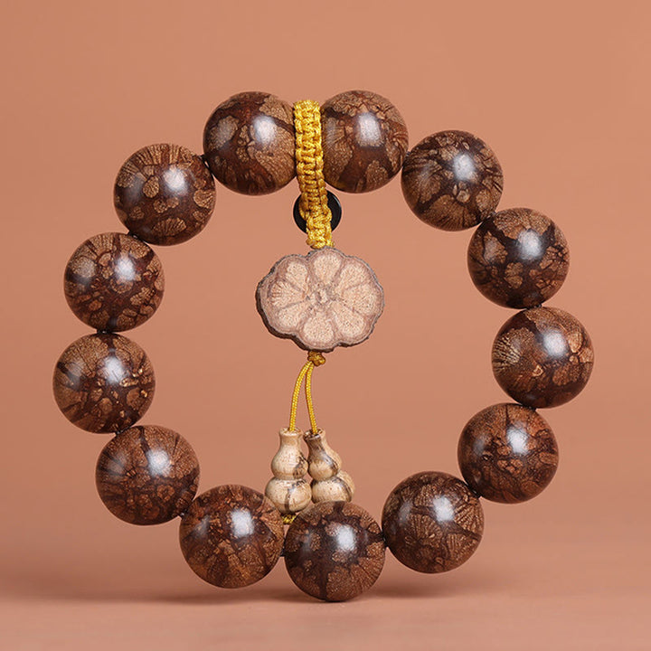 Pulsera de Madera de Flor de Ciruelo de Buddha Stones para la Paz Interior