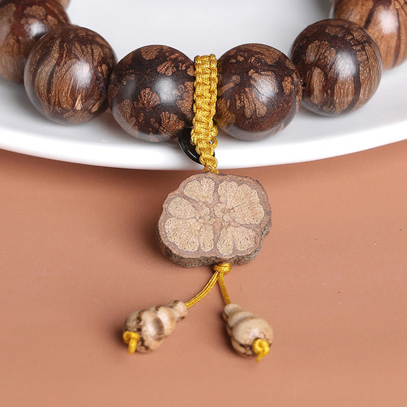 Pulsera de Madera de Flor de Ciruelo de Buddha Stones para la Paz Interior