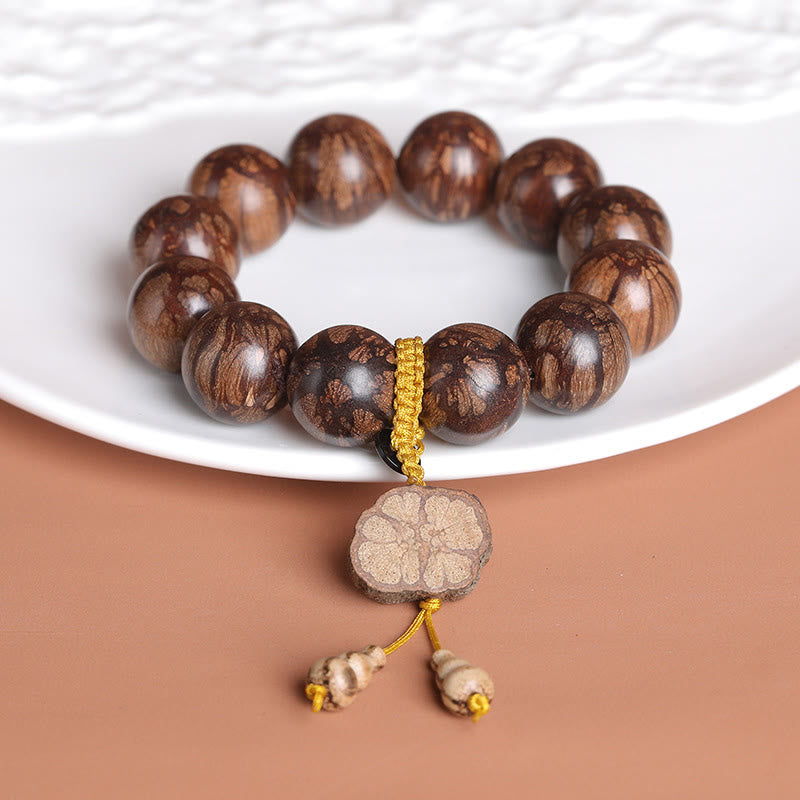 Pulsera de Madera de Flor de Ciruelo de Buddha Stones para la Paz Interior