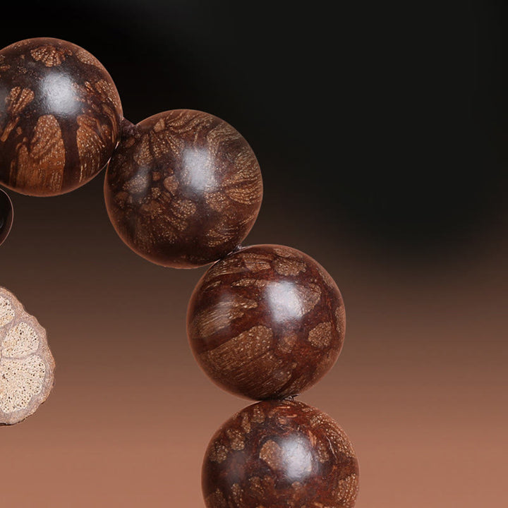 Pulsera de Madera de Flor de Ciruelo de Buddha Stones para la Paz Interior