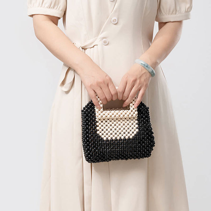 Bolso cuadrado tejido a mano con cuentas de madera y piedras de Buda