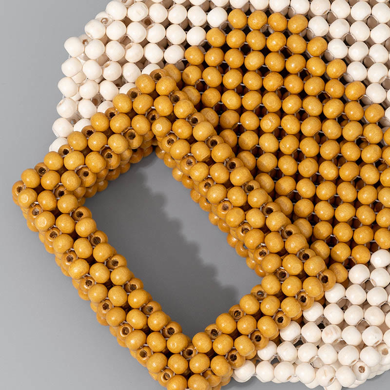 Bolso cuadrado tejido a mano con cuentas de madera y piedras de Buda