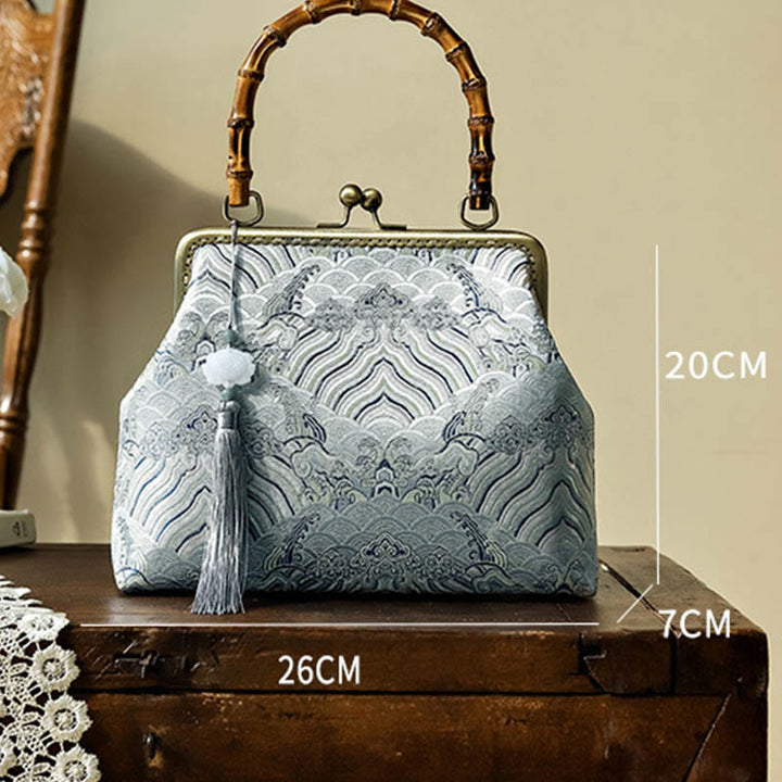 Bolso cruzado con cadena de metal, líneas plateadas y mango de bambú de Piedras Buddha