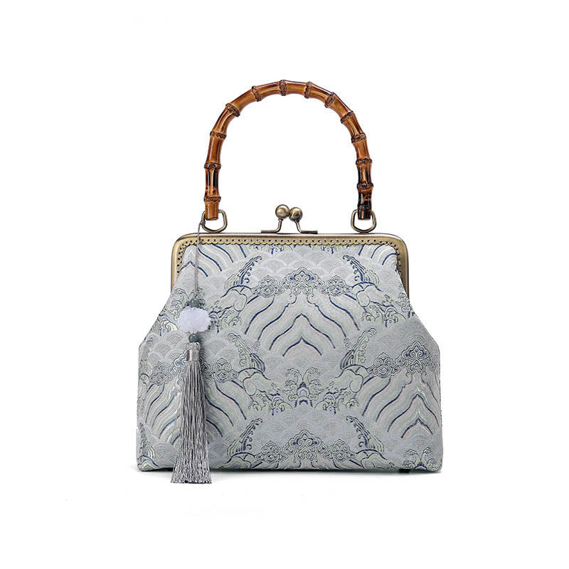 Bolso cruzado con cadena de metal, líneas plateadas y mango de bambú de Piedras Buddha