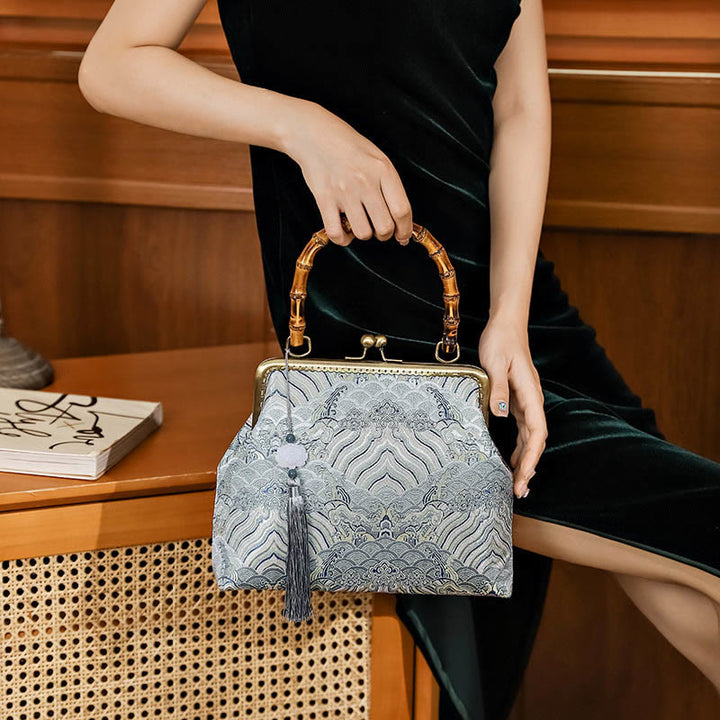 Bolso cruzado con cadena de metal, líneas plateadas y mango de bambú de Piedras Buddha