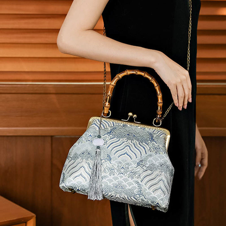 Bolso cruzado con cadena de metal, líneas plateadas y mango de bambú de Piedras Buddha