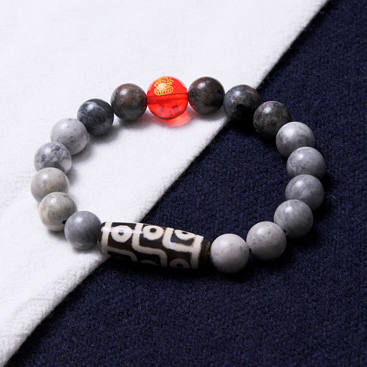 Pulsera positiva de jaspe Picasso con cuentas Dzi tibetanas de nueve ojos con Buddha Stones