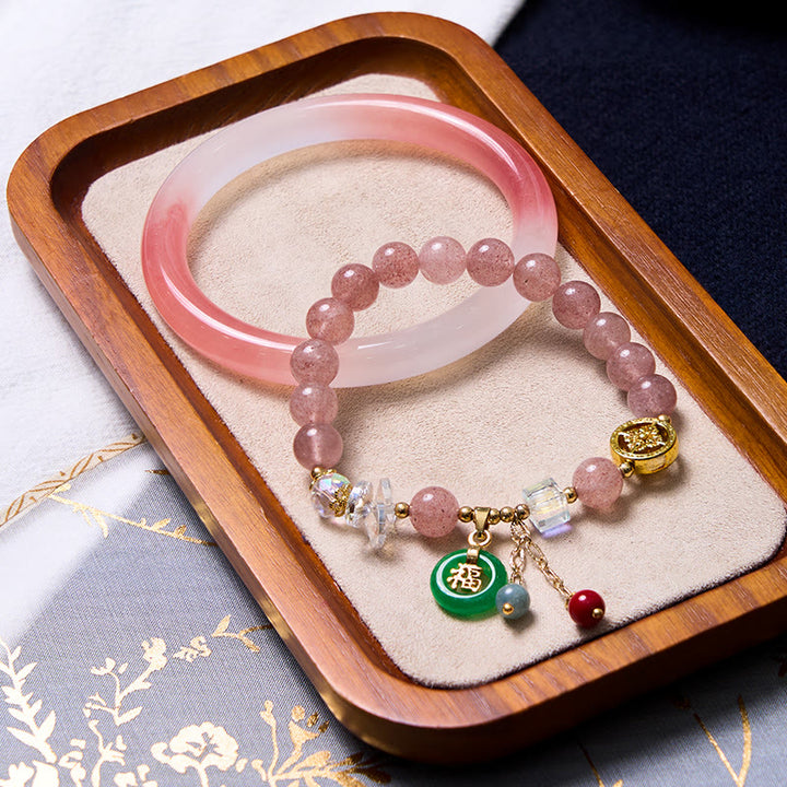 Buddha Stones Atraer amor y protección Pulsera rosa Paquete