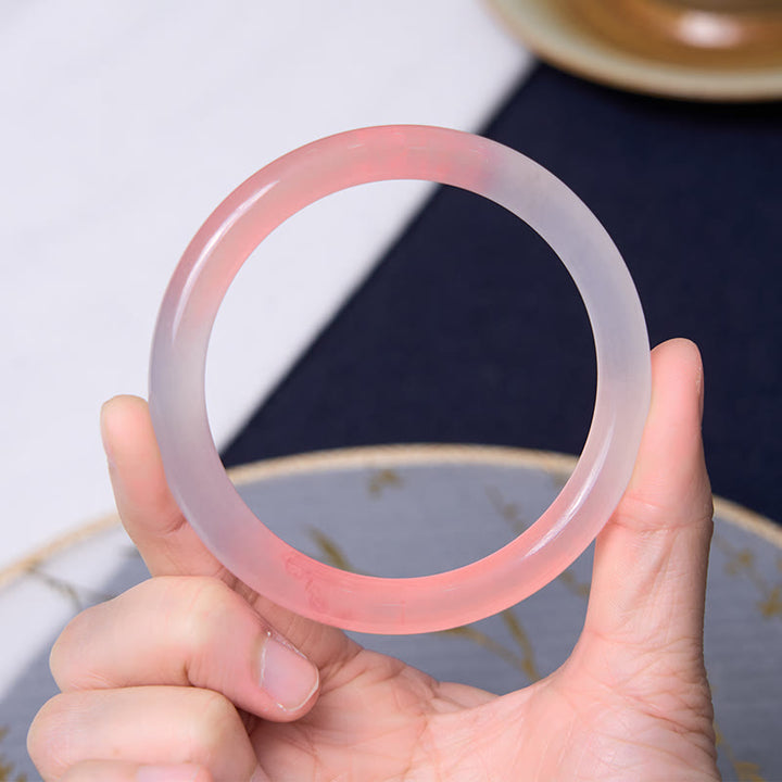 Buddha Stones Atraer amor y protección Pulsera rosa Paquete