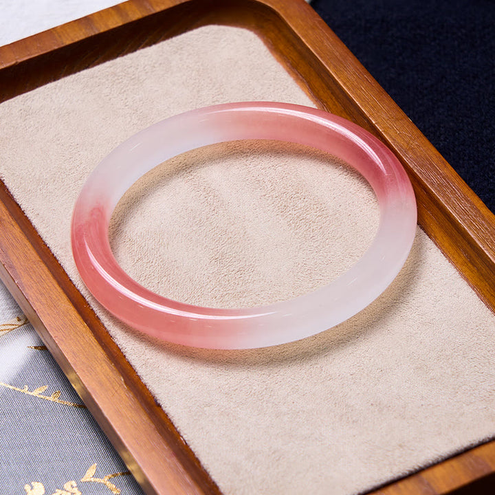 Buddha Stones Atraer amor y protección Pulsera rosa Paquete