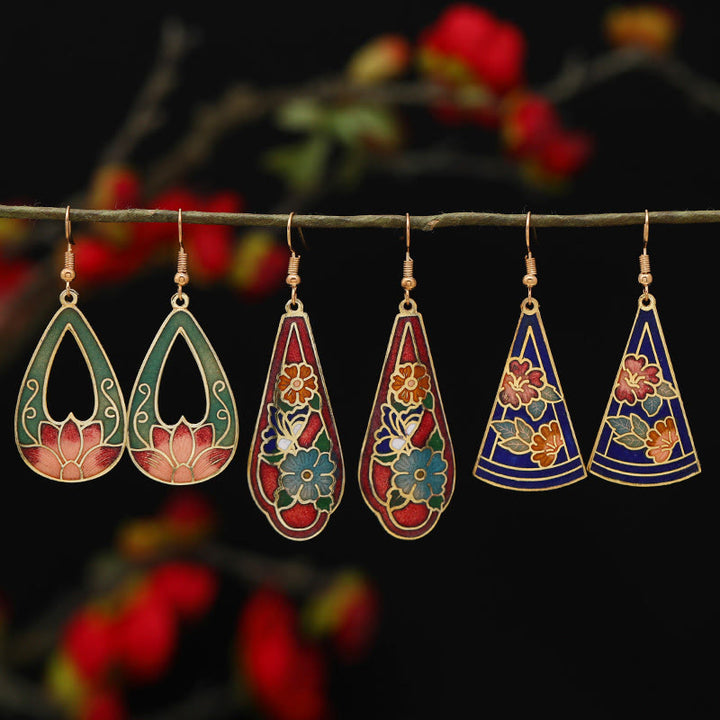 Buddha Stones Pendientes Colgantes de Flor de Loto Mariposa de Aleación de Cobre de Iluminación