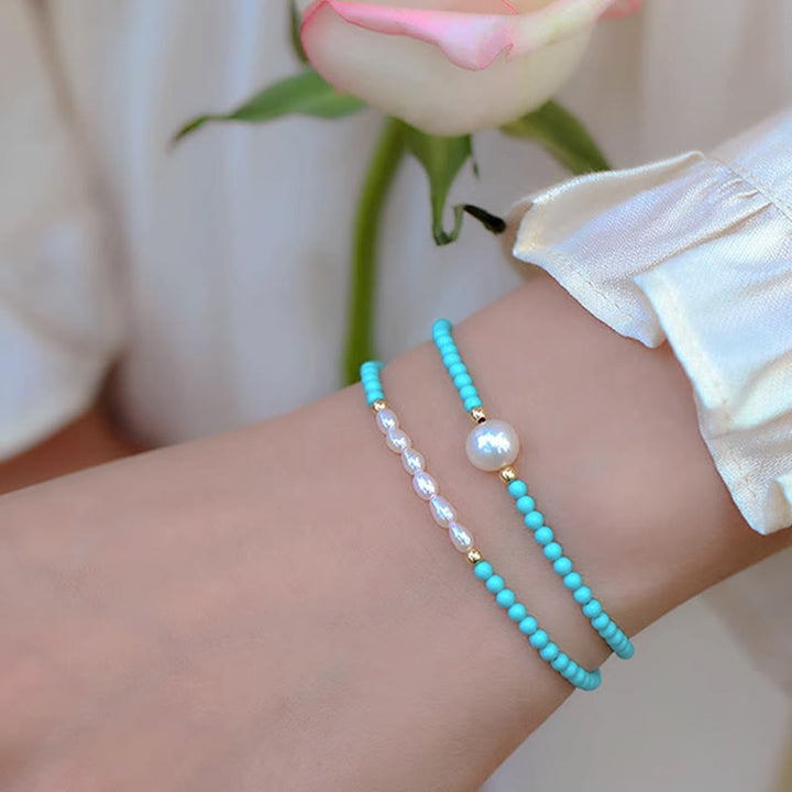 Pulsera de protección de pequeñas cuentas de piedras de Buda con turquesa, ágata roja y perla