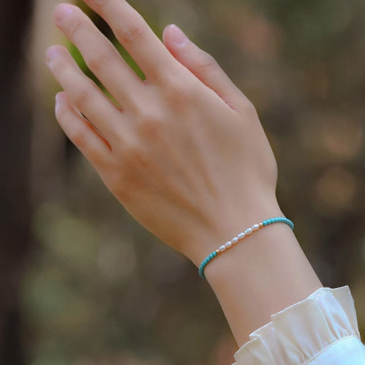 Pulsera de protección de pequeñas cuentas de piedras de Buda con turquesa, ágata roja y perla