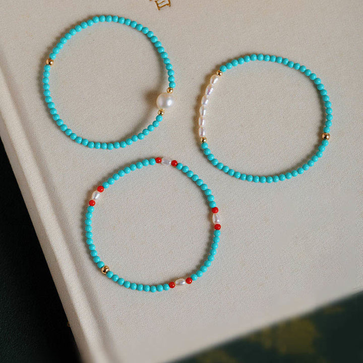 Pulsera de protección de pequeñas cuentas de piedras de Buda con turquesa, ágata roja y perla