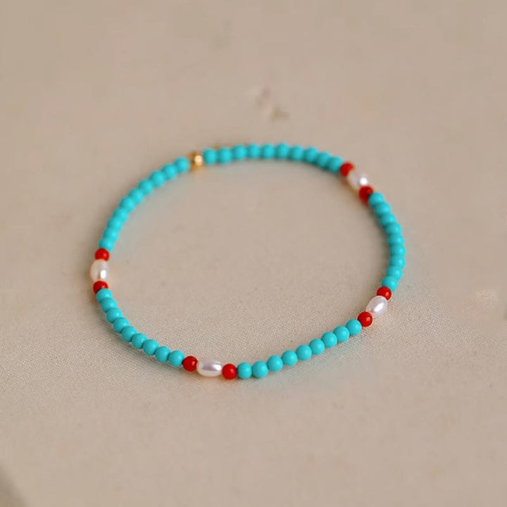 Pulsera de protección de pequeñas cuentas de piedras de Buda con turquesa, ágata roja y perla